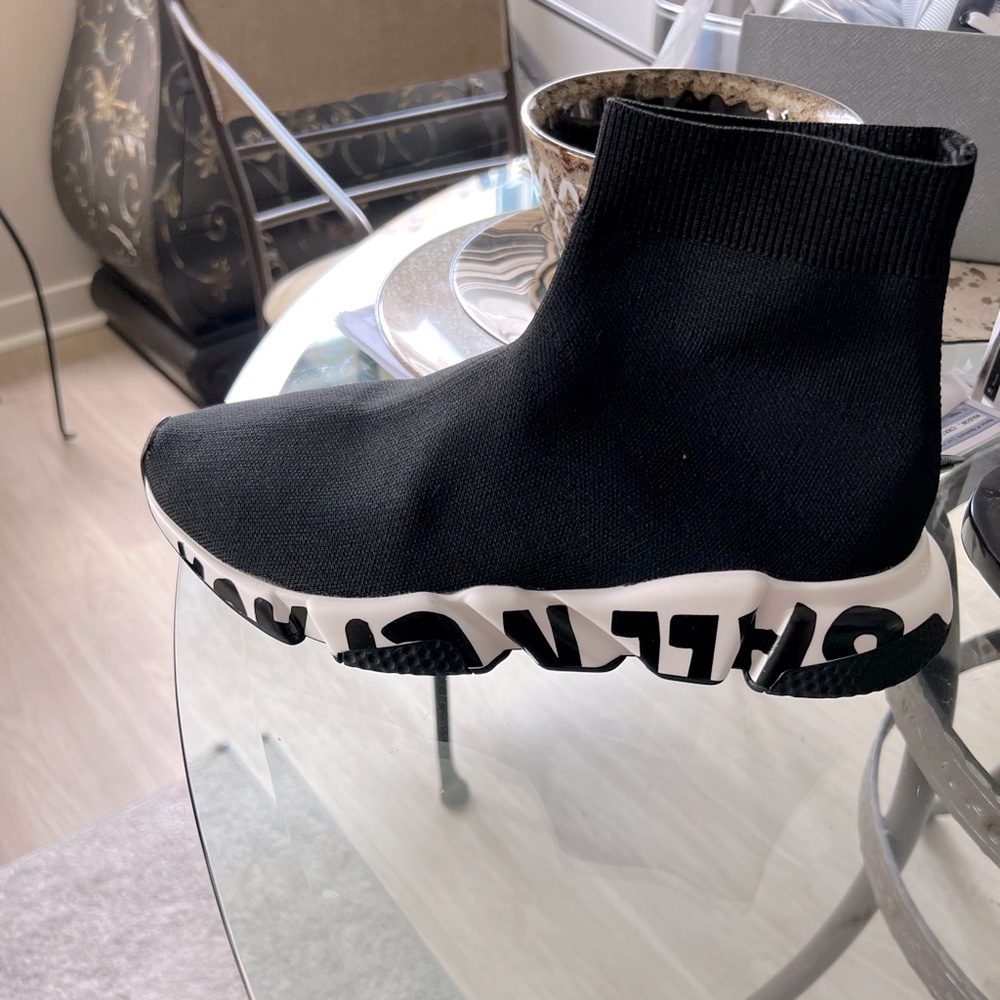 The black and white Balenciaga sock shoe boot.